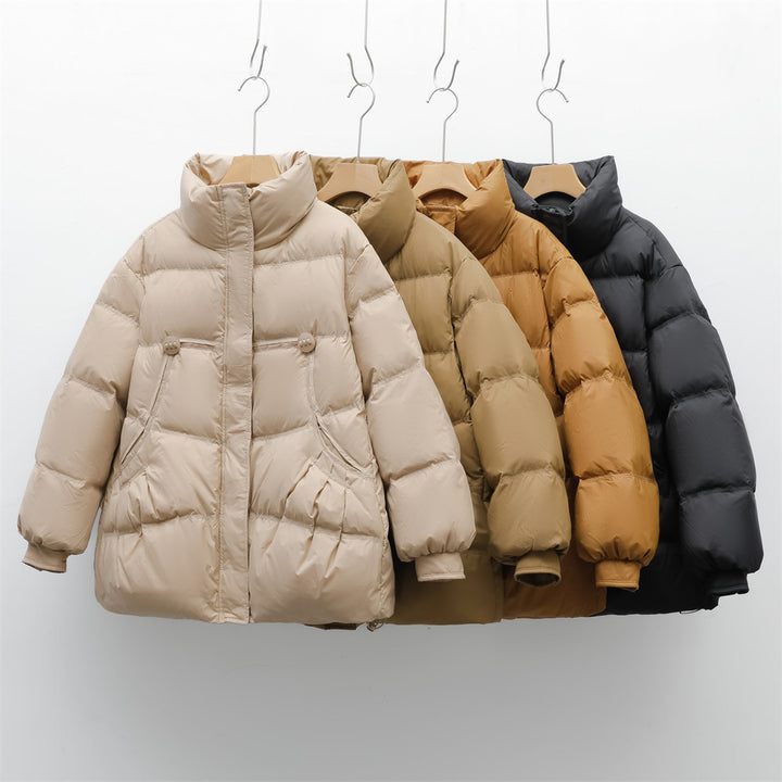 Bulky winter jacket for women with practical pockets and high collar Lune London