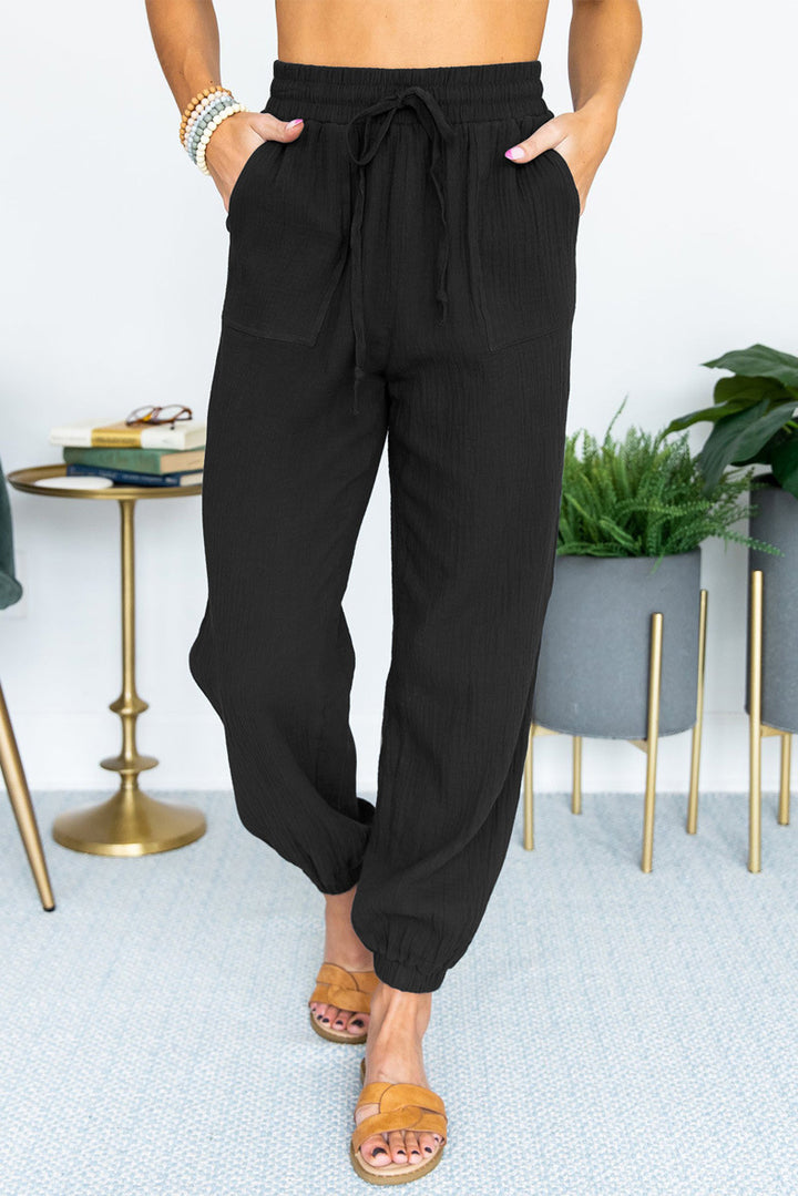Casual women's pants with elastic waistband and practical pockets Lune London