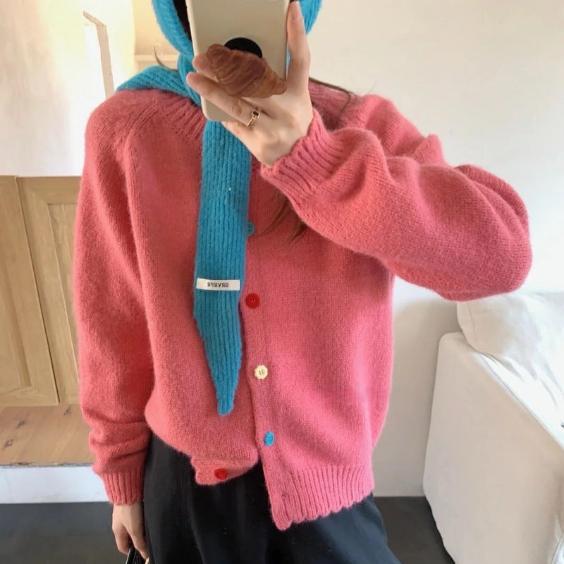 Gilet en tricot ludique pour femme avec détails de boutons colorés et coupe décontractée Chic & Stil