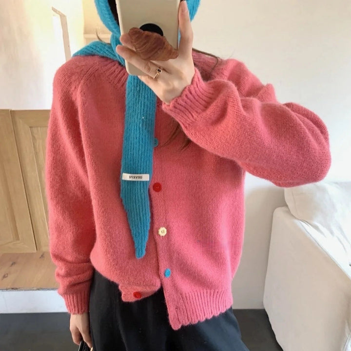 Gilet en tricot ludique pour femme avec détails de boutons colorés et coupe décontractée Chic & Stil