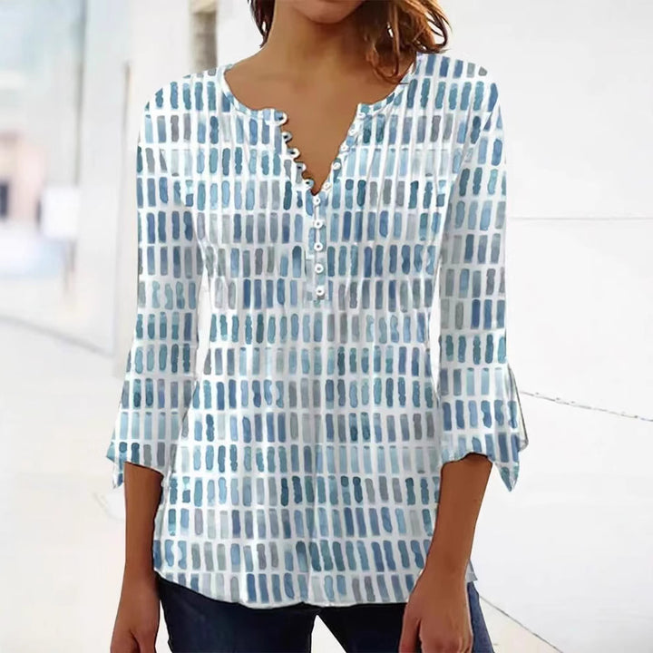 Blouse pour femmes au design graphique moderne avec détails de boutons Chic & Stil