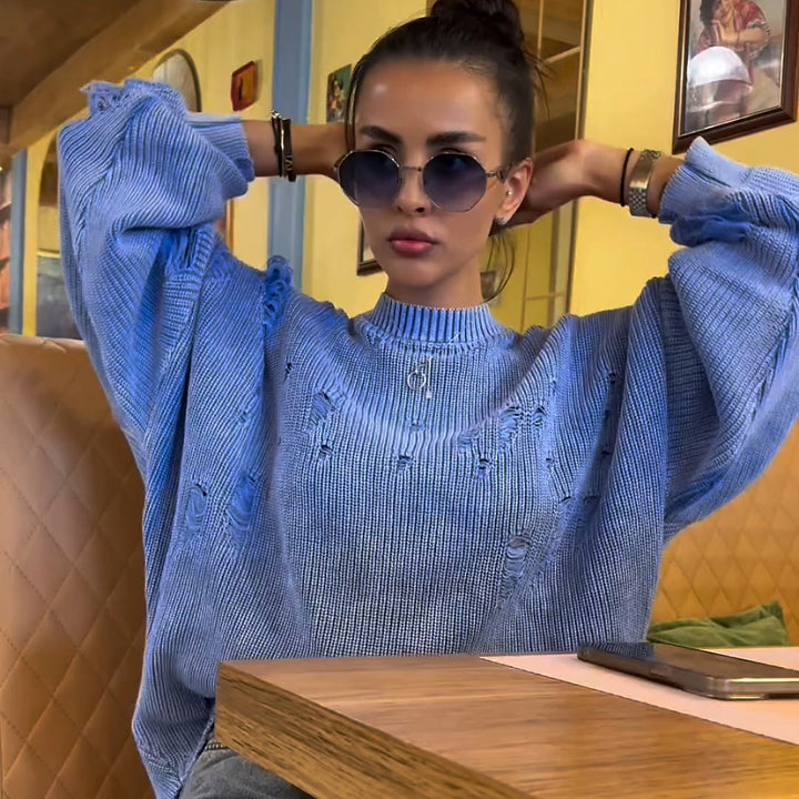 Casual women's sweater with a trendy ripped design and voluminous sleeves Lune London