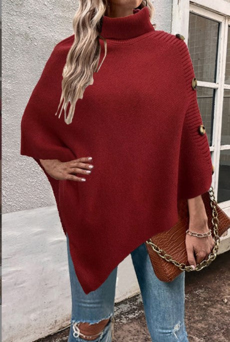 Ladies knitted poncho with high collar and button details Lune London