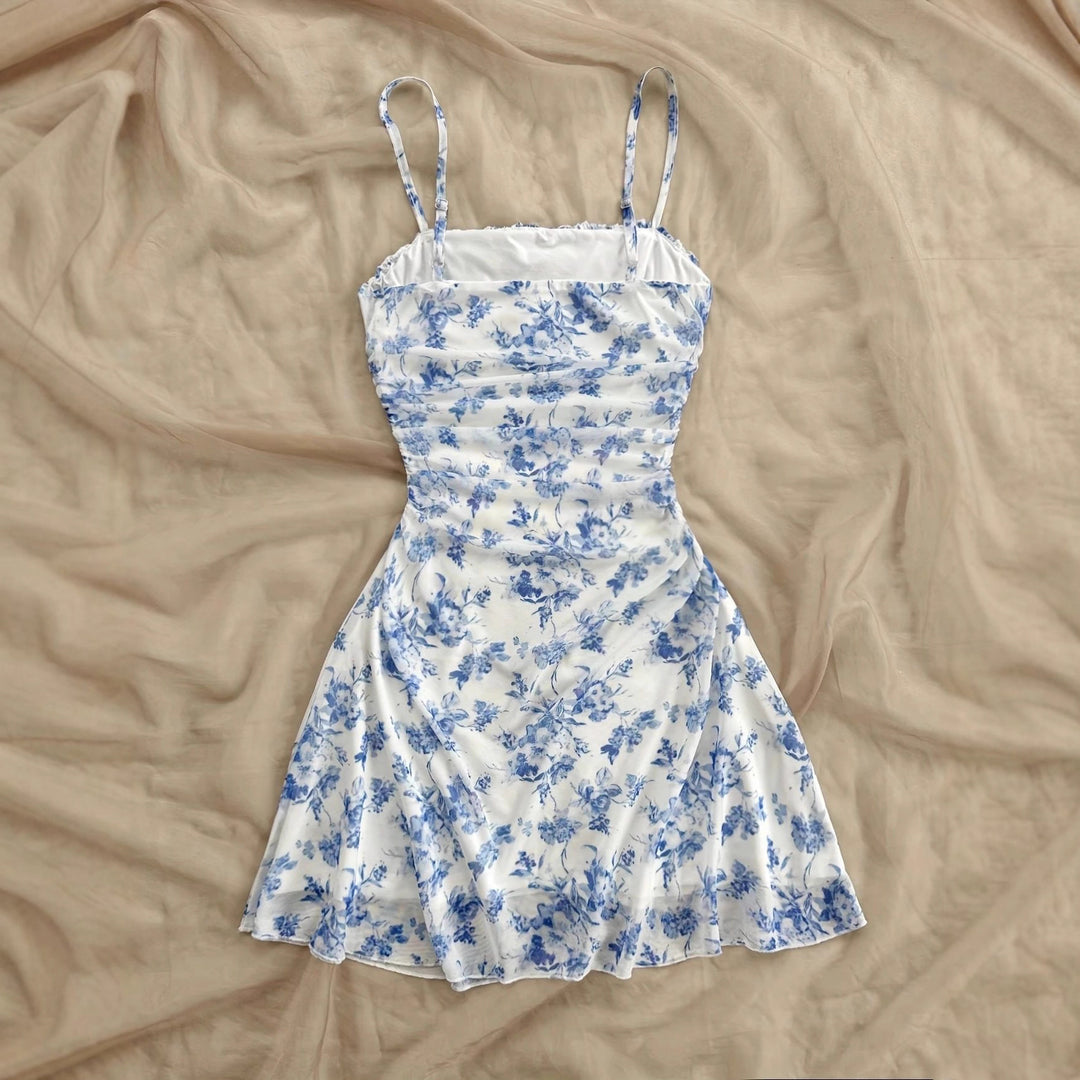 Women's summer floral dress with spaghetti straps and gathers Lune London