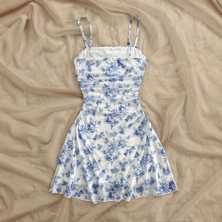 Women's summer floral dress with spaghetti straps and gathers Lune London