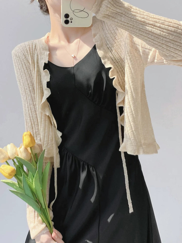 Women's knitted jacket with ruffle details and airy structure Lune London