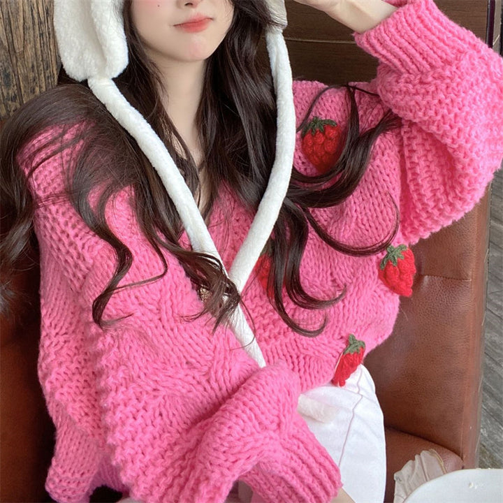 Cardigan en maille épaisse pour femmes avec de jolies appliqués de fleurs et des boutons dorés Chic & Stil