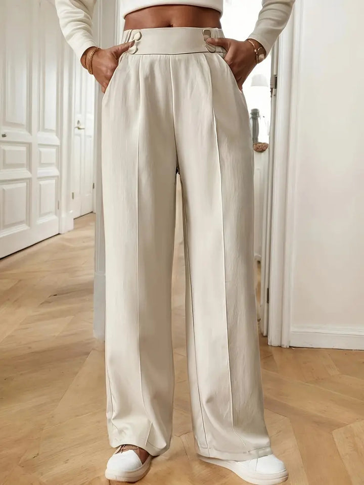 Elegant and airy high-waisted pants for women with wide legs and practical pockets Lune London