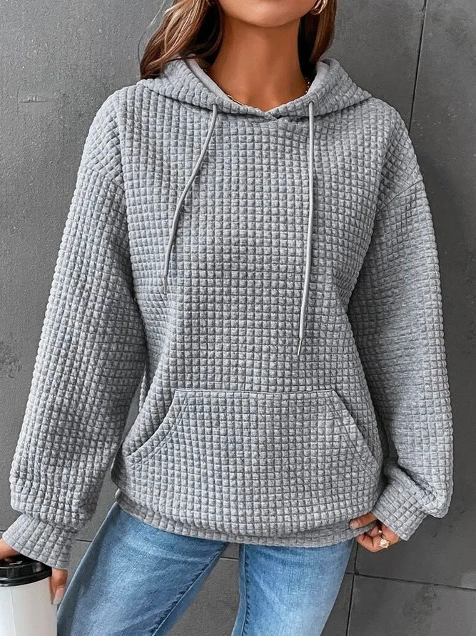 Casual hoodie for women with textured surface and practical kangaroo pocket Lune London