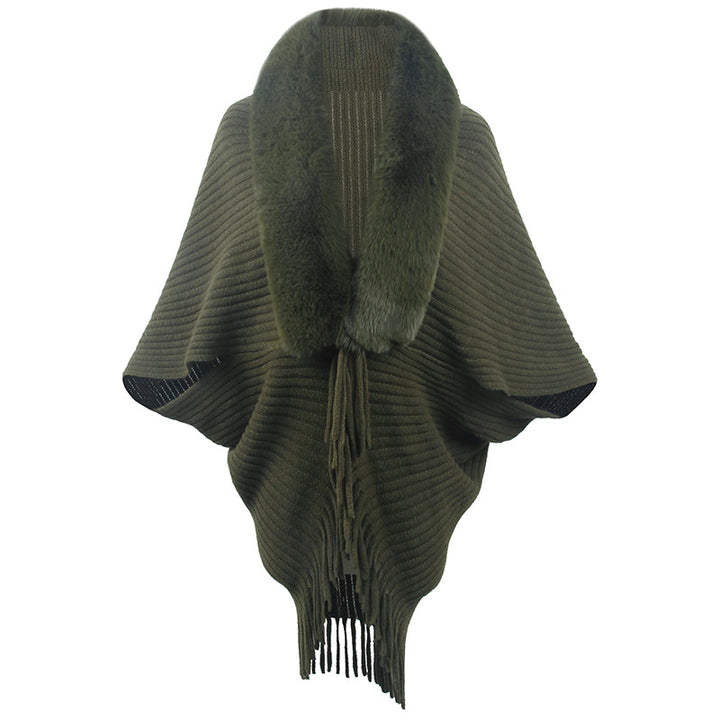Luxurious knitted poncho for women with elegant faux fur collar and fringes Lune London