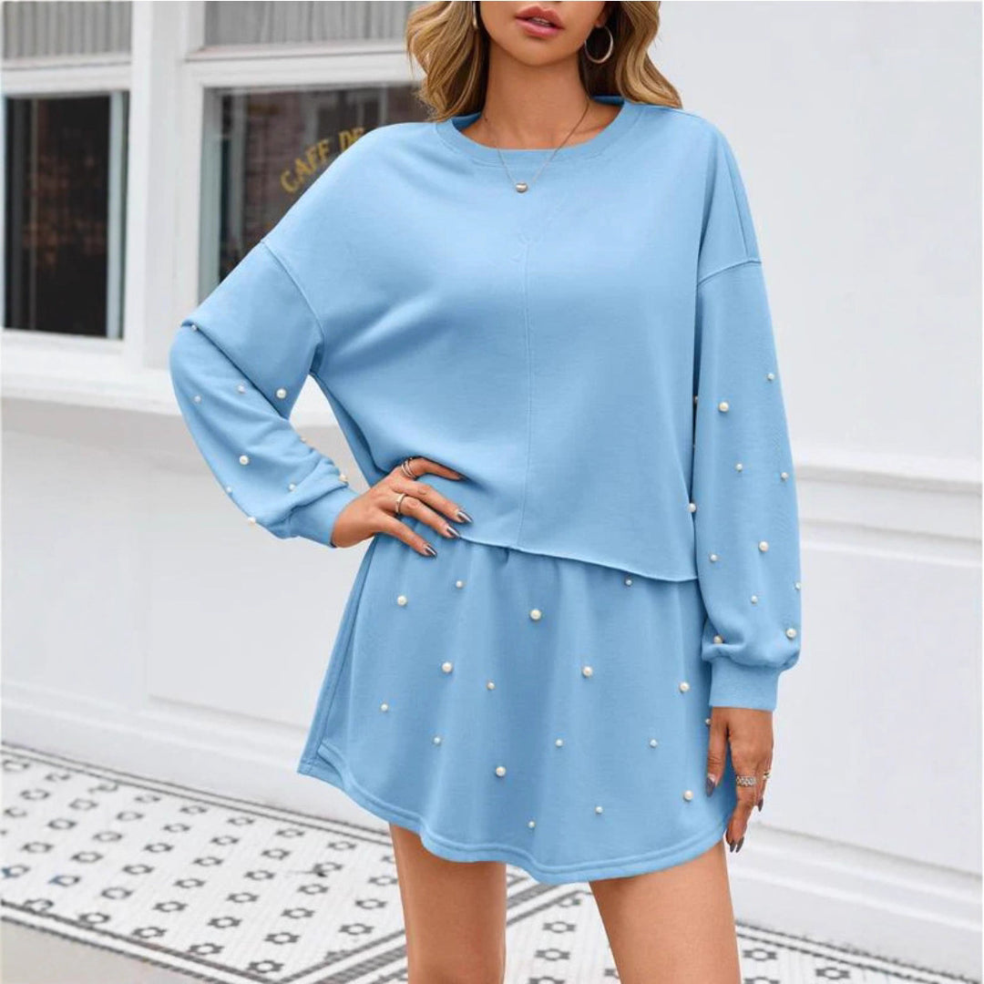 Robe sweat-shirt pour femmes avec des creux et des applications de perles Chic & Stil