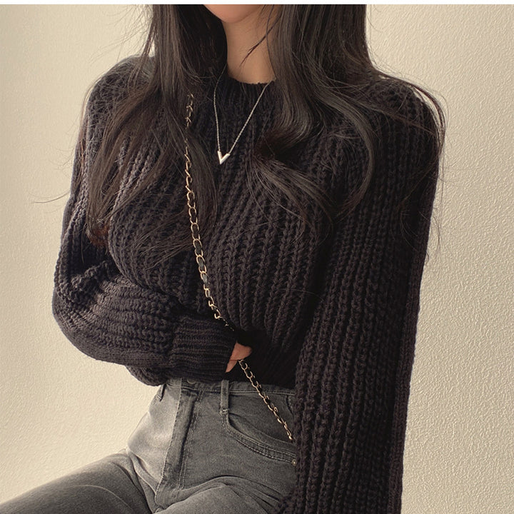 Thick knit women's sweater with oversized sleeves and a textured structure Lune London
