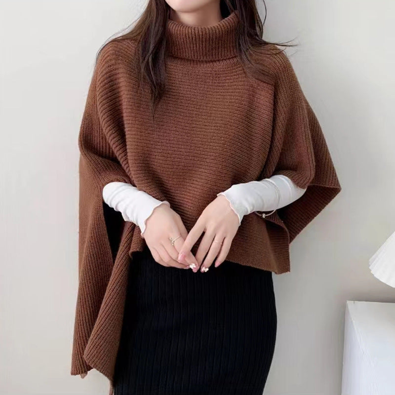 Ladies knitted poncho with high collar and elegant ribbed texture Lune London