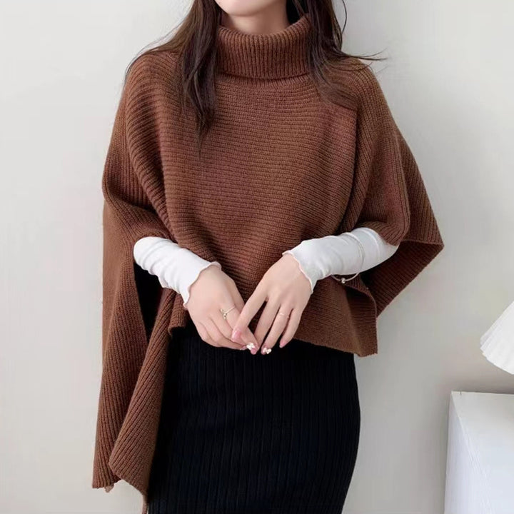 Ladies knitted poncho with high collar and elegant ribbed texture Lune London