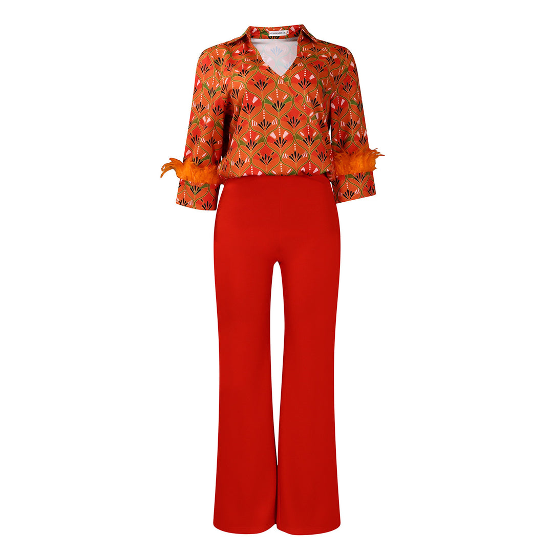 Expressive outfit for women with printed blouse and wide pants Lune London