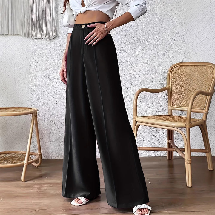 Wide palazzo pants for women with a stylish high waist cut and a button detail Lune London