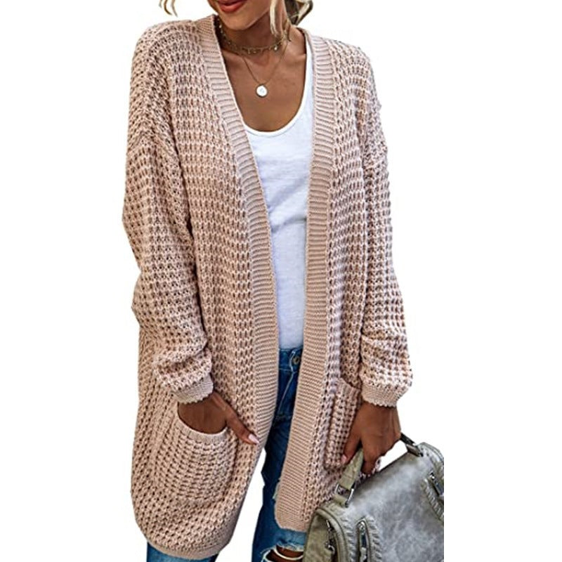 Chunky knit women’s cardigan with a relaxed fit and practical pockets Lune London