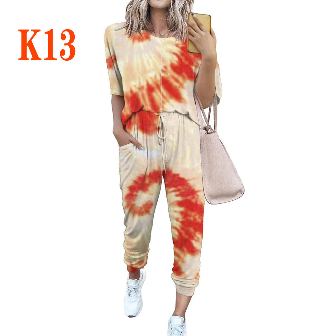 Ladies lightweight casual jumpsuit with a striking tie-dye pattern and practical pockets Lune London