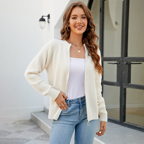 Women's knitted jacket with a modern textured pattern and practical zippered pockets Lune London