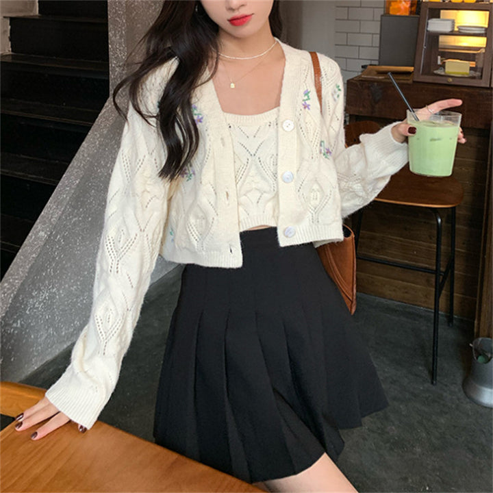 Ladies short knit vest with floral accents and openwork pattern Lune London