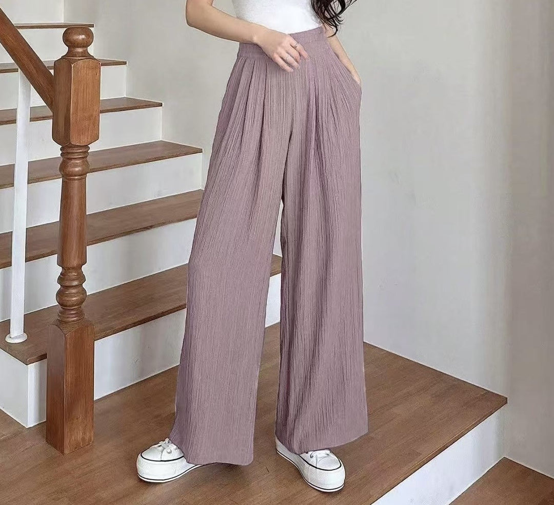 Wide pleated trousers for women with high pockets and elastic waist Lune London
