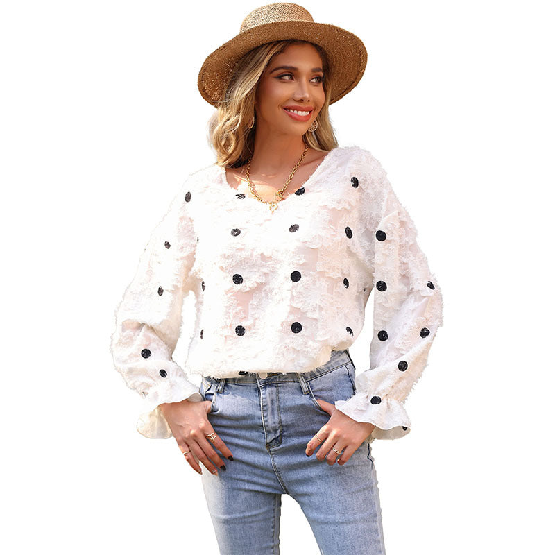 Tunique féminine à la mode avec un motif floral décoratif et des manches bouffantes Chic & Stil