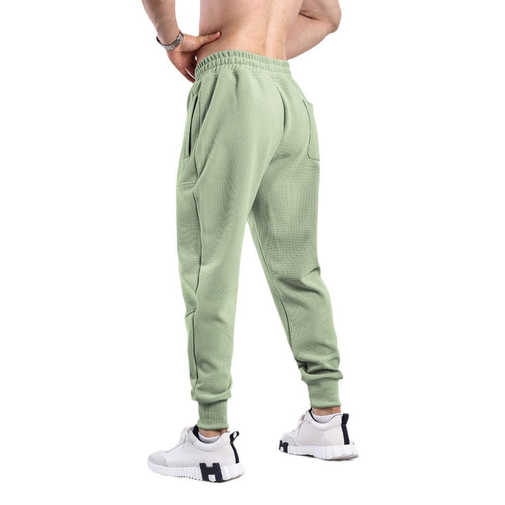 Men's sporty jogger pants with breathable inserts and elastic waistband Lune London