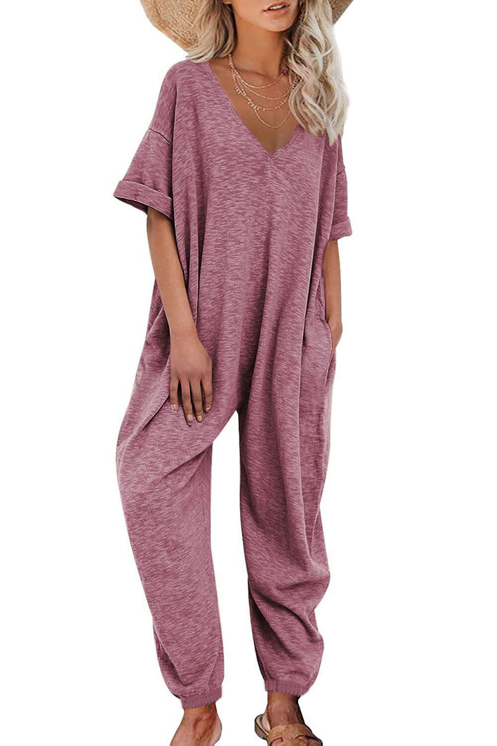 Oversized jumpsuit for women with deep V-neckline and casual pockets Lune London