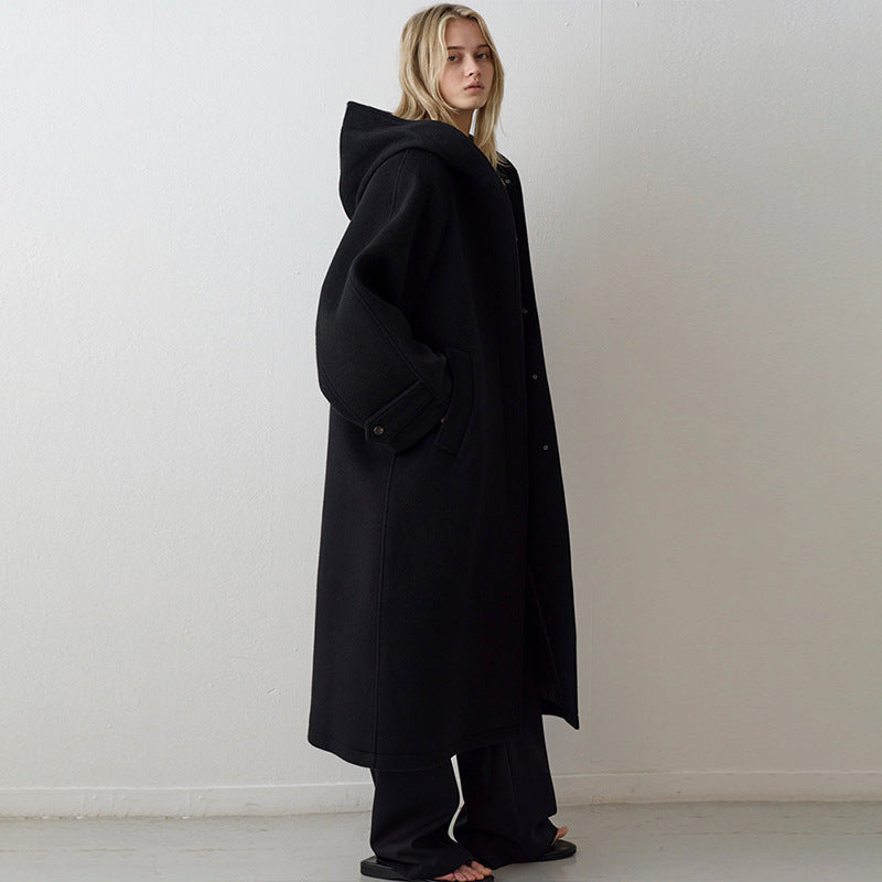 Manteau en laine surdimensionné pour femmes avec capuche et poches pratiques Chic & Stil