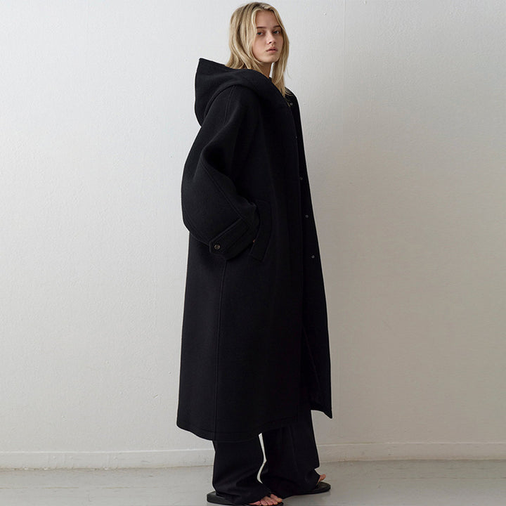 Manteau en laine surdimensionné pour femmes avec capuche et poches pratiques Chic & Stil