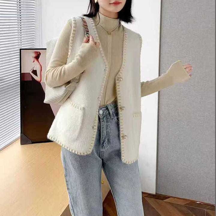 Ladies knitted vest with decorative button details Lune London