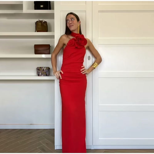 Maxi dress for women with a playful halter neck and an elegant bow. Lune London