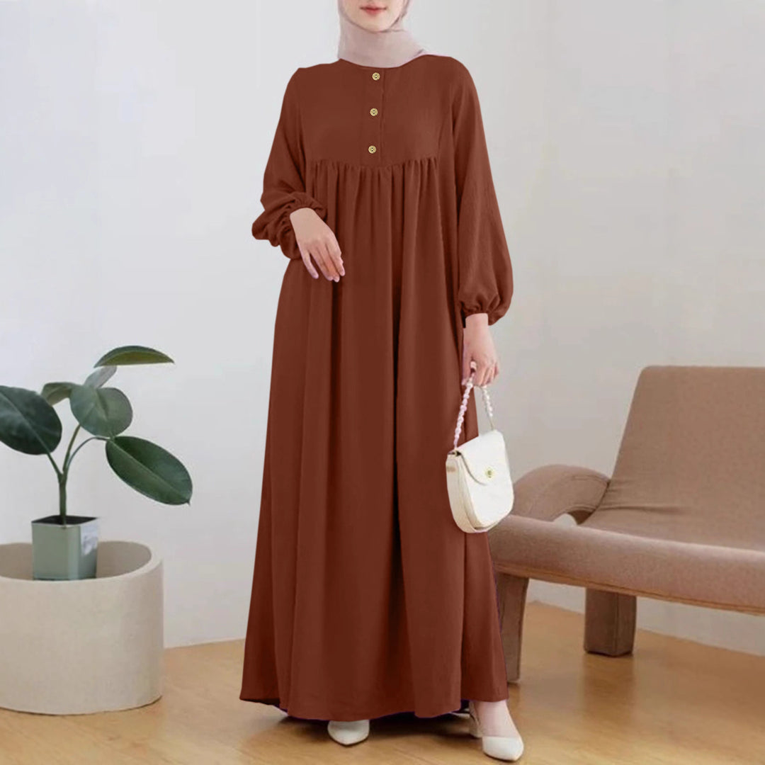 Lightweight maxi dress for women with comfortable buttoning and elegant puff sleeves Lune London