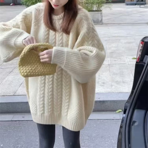 Chunky knit sweater for women with trendy cable patterns and dropped shoulders Lune London