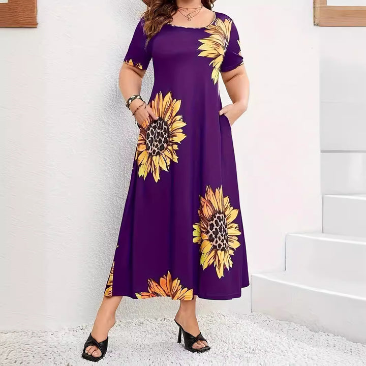 Summer maxi dress for women with sunflower floral pattern and practical pockets Lune London
