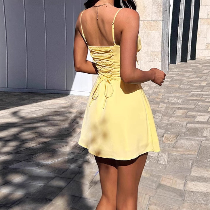 Lune London mini dress for women with adjustable straps and ruffle details