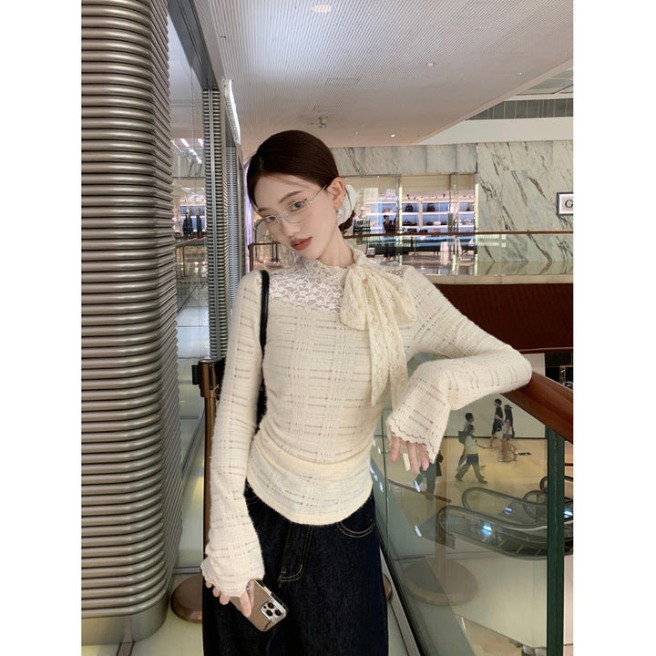 Women's elegant long-sleeve blouse with lace and bow details Chic & Stil