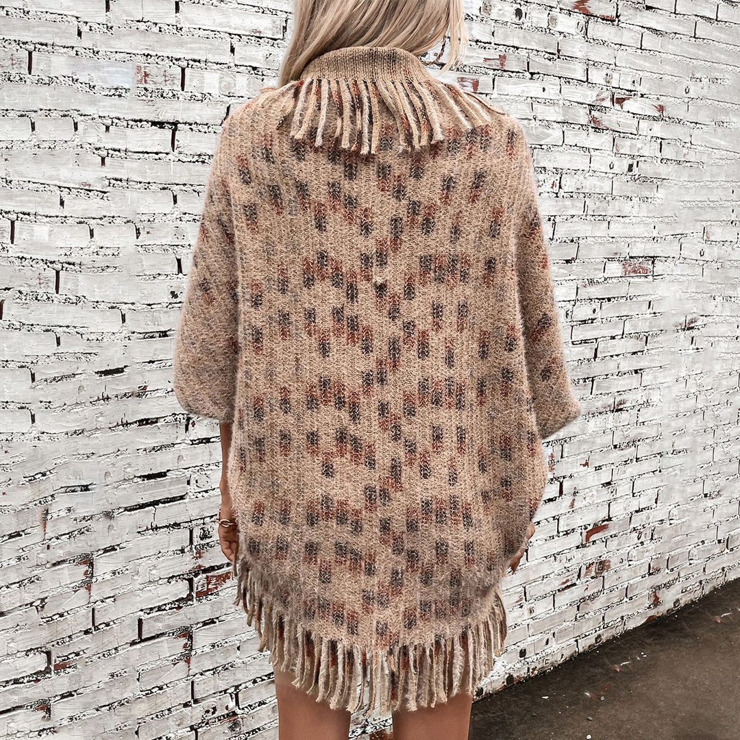 Ladies elegant poncho with fringed details and a modern plaid pattern Lune London