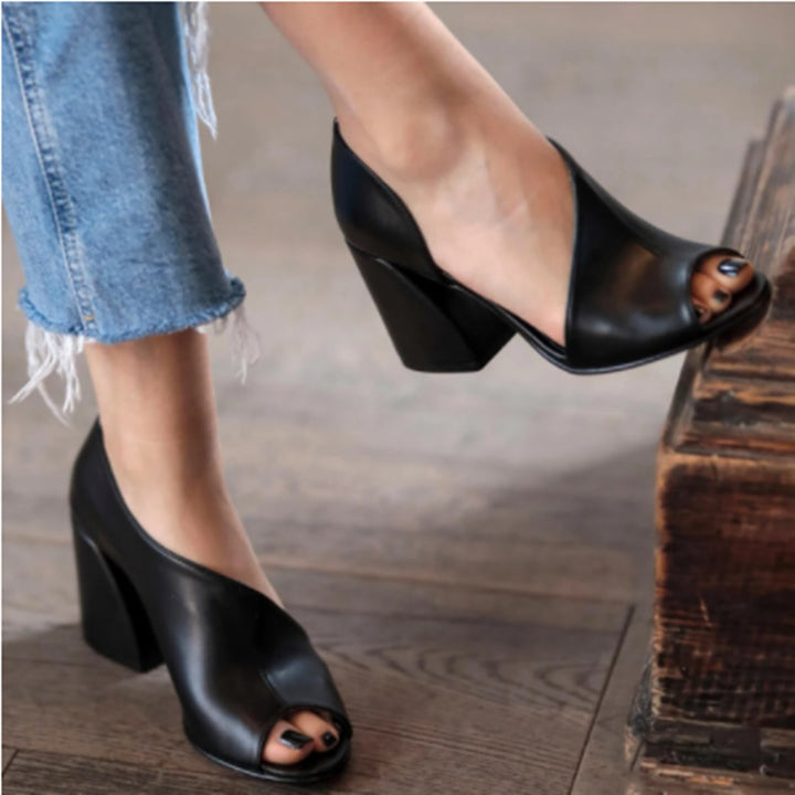 Elegant women's peep-toe pumps with a wide block heel and a curved design Lune London