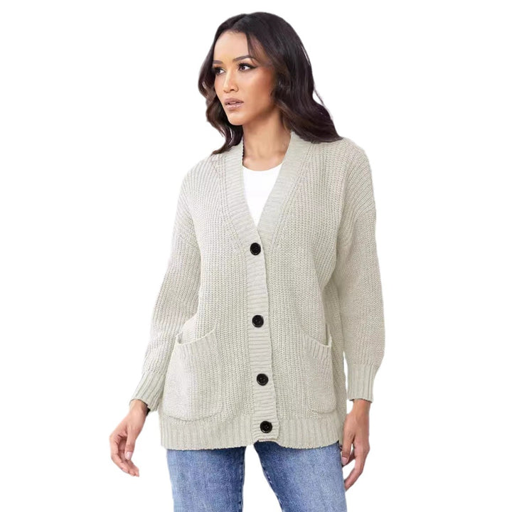 Fashionable knitted jacket for women with button closure all the way down and large pockets Lune London