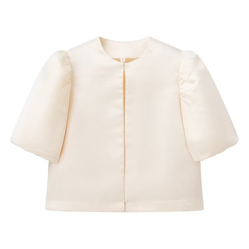 Veste élégante pour femmes avec des manches bouffantes et une coupe courte Chic & Stil