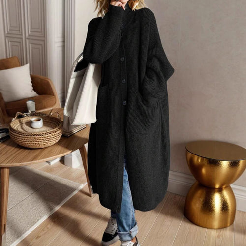Trendy knitted jacket for women with generous pockets and chic button detail