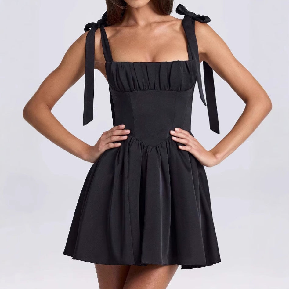 Airy summer dress for women with a pretty back cutout and charming bows Lune London