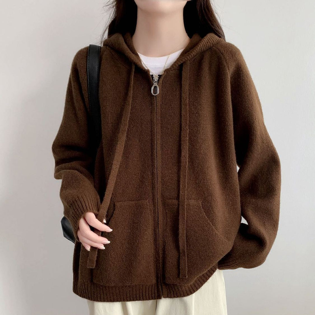 Veste à capuche pour femmes surdimensionnée avec une coupe courte et des poches pratiques Chic & Stil