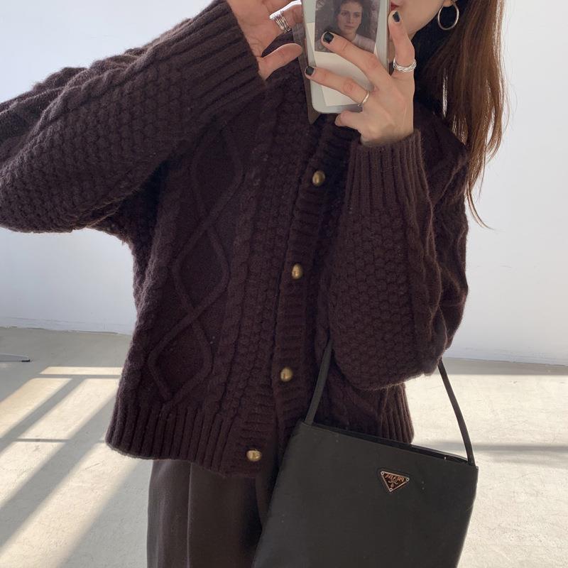 Thick knitted cardigan for women with button details and cable knit pattern Lune London