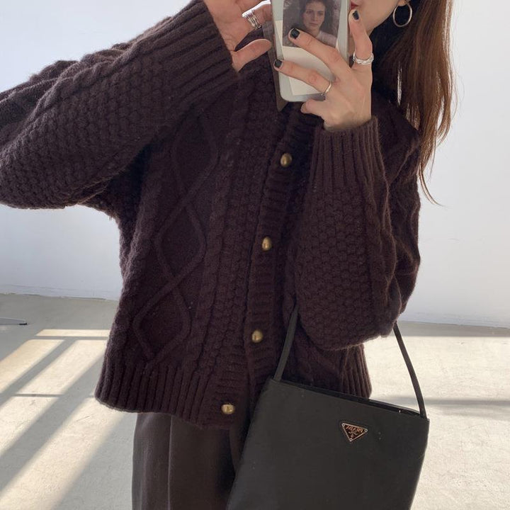 Thick knitted cardigan for women with button details and cable knit pattern Lune London