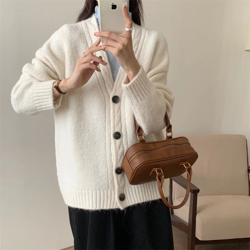 Ladies Comfortable Knit Sweater with an Elegant V Neck and Chic Button Details