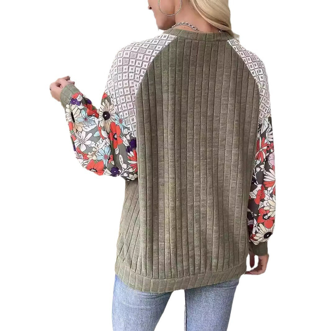Women's sweater with a playful shape featuring a chic floral sleeve design