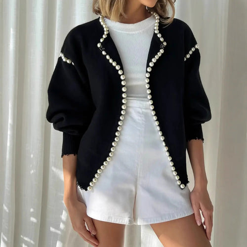 Women's knit jacket with striking bead embellishments and an open design Lune London