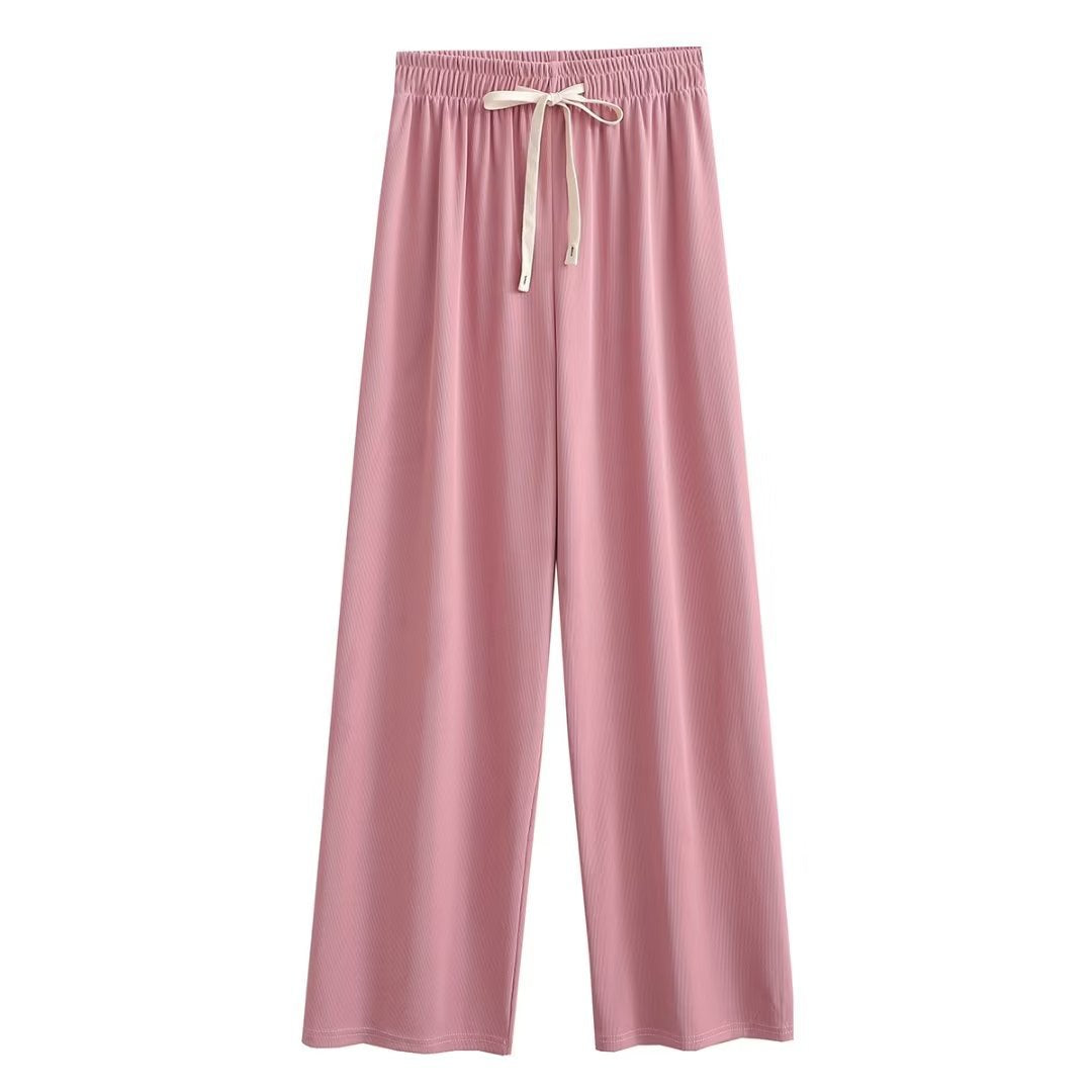 Wide palazzo pants for ladies with elastic waistband and decorative cord Lune London